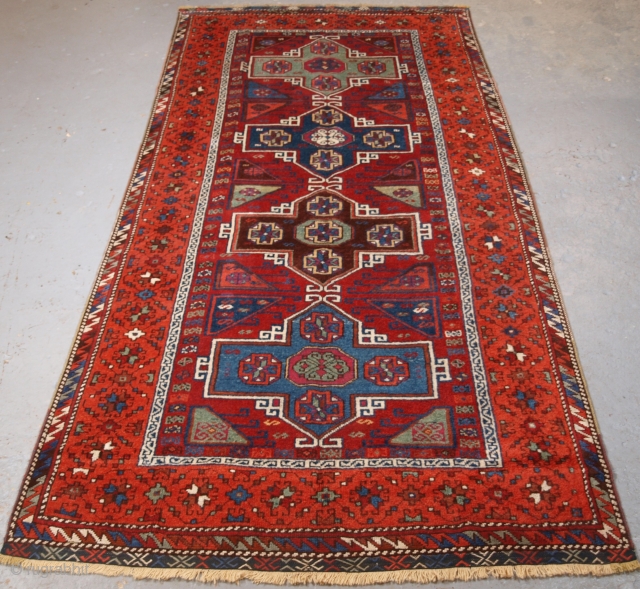 Antique Eastern Anatolian Kurdish Yuruk long rug with four medallion design. www.knightsantiques.co.uk 

Size: 7ft 5in x 3ft 8in (227 x 113cm).

Circa 1890.

An excellent example of a Yuruk long rug, with a classic  ...