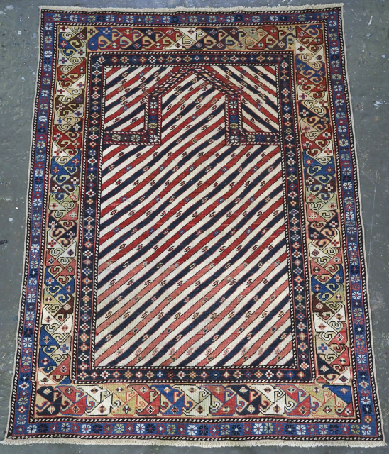 Antique Caucasian Shirvan or Dagestan prayer rug with scarce diagonal stipe design.
www.knightsantiques.co.uk 
Circa 1870.
Size: 4ft 9in x 3ft 7in (145 x 109cm).
An outstanding example of this well documented group of prayer rugs,  ...