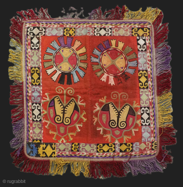 Uzbek ilgich, silk embroidery on Mogul red cotton. Size: 44 x 42cm excluding tassels.
                   