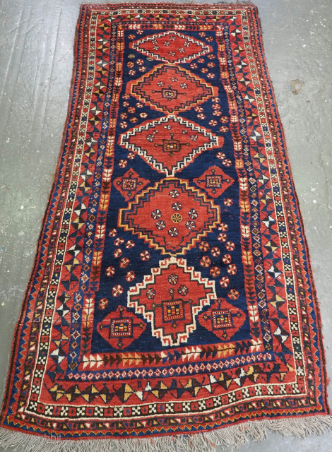 Antique Luri tribal long rug with medallion design.
Size: 9ft 6inx 4ft 8in (290 x 142cm).
Circa 1900.
email: simon@knightsantiques.co.uk
D-1256                