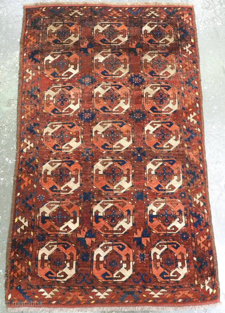 Antique Turkmen rug of small size and early date.

19th century.

An intriguing small Turkmen rug, with an archaic gul design. The three vertical rows of seven Turkmen guls are on a abrashed madder  ...