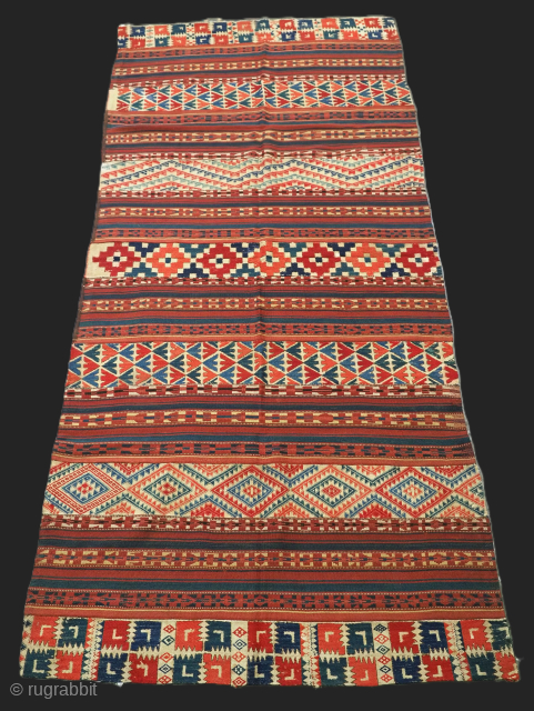 Antique Uzbek flat weave kilim from the Kungrad region.

Circa 1890.

This interesting kilim is woven in 13 individual strips that are then stitched together, each strip is decorated with different design in various  ...