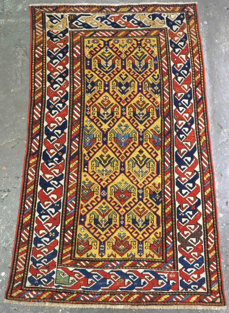 Small antique yellow ground Dagestan rug, size: 154 x 96cm.                       