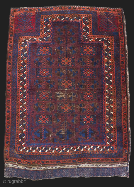 Antique Baluch prayer rug by the Yaqoub Khani sub tribe of the Timuri, with box design on a scarce aubergine coloured ground.
Size: 4ft 0in x 2ft 10in (122 x 87cm).
Circa 1880 or  ...