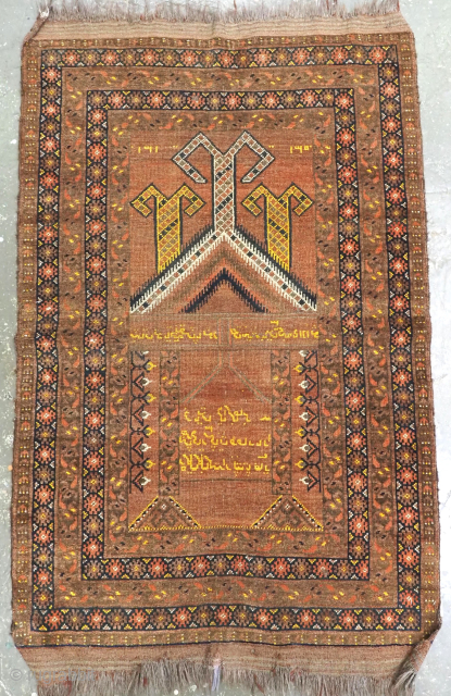 Antique Afghan Kizil Ayak Turkmen prayer rug with triple rams horn design to the Mihrab.
Size: 4ft 5in x 2ft 9in (134 x 85cm).
Circa 1892.
A very rare Afghan prayer rug which is inscribed ...