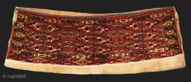 Antique Tekke Turkmen 9 gul torba / mafrash.
Size: 2ft 10in x 1ft 0in (86 x 30cm).
Circa 1870 or earlier.

This small Tekke Turkmen torba / mafrash is a small bag used for keeping  ...