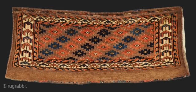 Antique Yomut Turkmen torba with well drawn 'ashik' gul design.
Size: 3ft 0in x 1ft 2in (92 x 35cm) face size.
Circa 1880.
A good Yomut torba with a soft colour palette and good soft ...