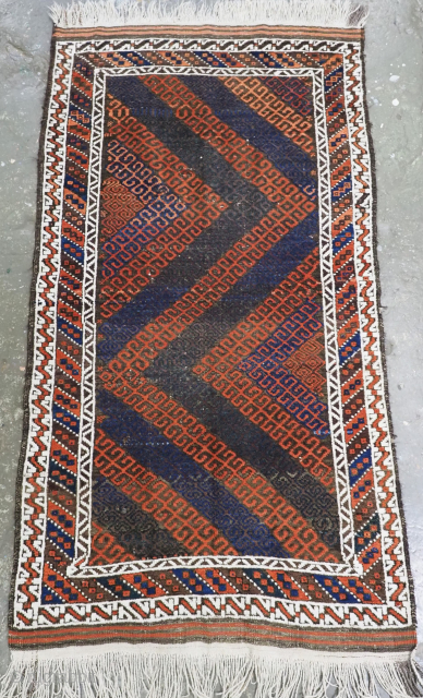 Antique Baluch rug from Western Afghanistan, probably Herat region, of small size with a bold Mushwani design giving a very striking visual effect.
Size: 5ft 3in x 2ft 10in (160 x 88cm).
Circa 1900.
This ...