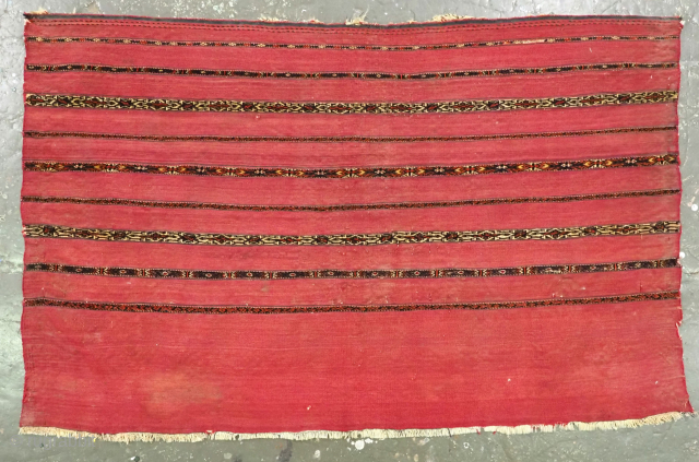 Antique Tekke Turkmen 'Kizil' chuval with a traditional banded design in mixed techniques.
Size: 4ft 3in x 2ft 8in (130 x 81cm).
Circa 1880.
Chuval are storage bags used by the Turkmen nomads for the ...