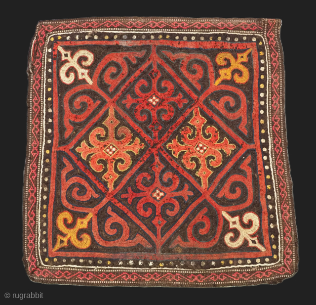 Antique Kirghiz embroidered felt panel.
Size: 2ft 4inx 2ft 3in (72 x 70m).
Circa 1900.

This panel is made of thick hand pressed felt, embroidered with a classic Kirghiz design.

The felt panel is in fair  ...