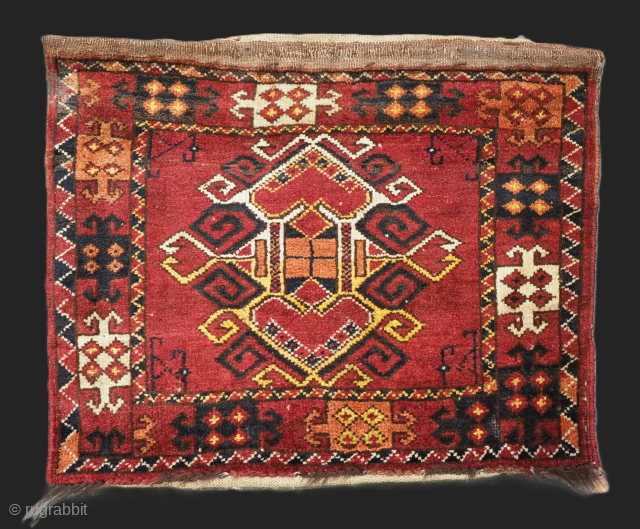 Antique Ersari Beshir Turkmen 'kap' or small bag complete with original plain weave back.
Size: 2ft 0in x 1ft 8in (62 x 50cm).
Circa 1920.

This small Ersari Turkmen bag known as a 'kap' or  ...