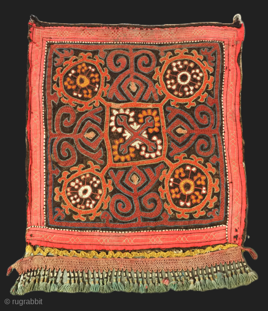 Antique Kirghiz embroidered felt panel.
Size: 2ft 3inx 2ft 2in (68 x 65m).
Circa 1900.

This panel is made of thick hand pressed felt, embroidered with a classic Kirghiz design. Note the applied panel with  ...