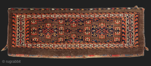 Antique Yomut Turkmen torba with well drawn 'kepse' gul design.
Size: 3ft 7in x 1ft 4in (108 x 40cm) face size.
Circa 1900.

A good Yomut torba with excellent colour and good wool. The torba  ...