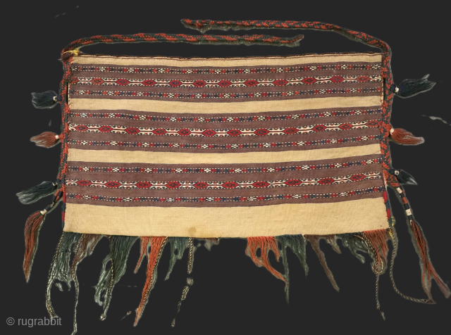 Antique Yomut Turkmen mafrash / torba in banded flatweave design.
Size: 2ft 7in x 1ft 5in (79 x 44cm) face size.
Circa 1900.

This small bag would have been used for the storage of personal  ...