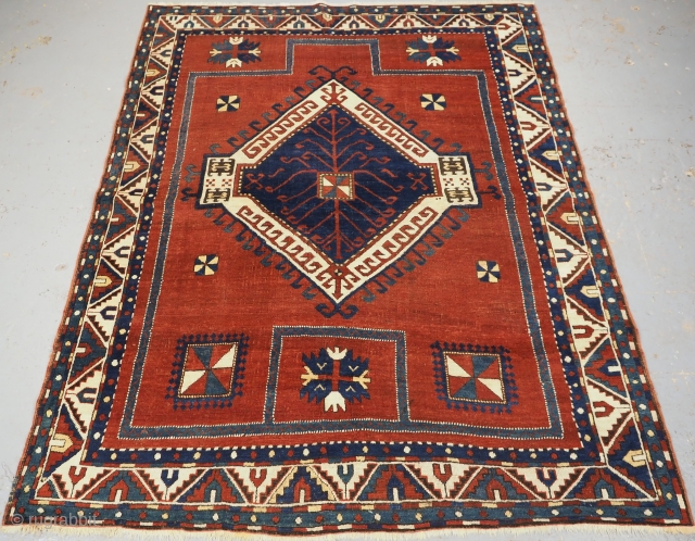 Antique Caucasian Fachralo Kazak prayer rug with large single medallion design. www.knightsantiques.co.uk 
Size: 6ft 4in x 5ft 0in. (192 x 153cm)
Circa 1880.

A beautifully drawn rug with an elegant simplicity, the large central  ...