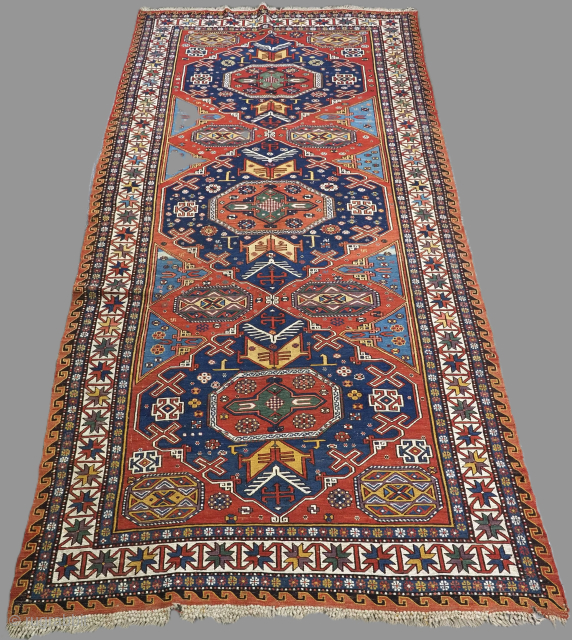 Antique Caucasian soumak carpet of three medallion design, excellent condition with superb colour.
Size: 370 x 182cm (12ft 2in x 6ft 0in).
Circa 1900.

This soumak is of the classic three medallion format, the small  ...