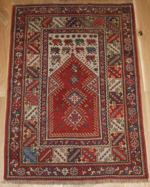 Antique Turkish Milas prayer rug of classic design with superb soft wool and small size. www.knightsantiques.co.uk Size: 4ft 3in x 3ft 0in (129 x 91cm). 

2nd half 19th century.

The rug has very  ...