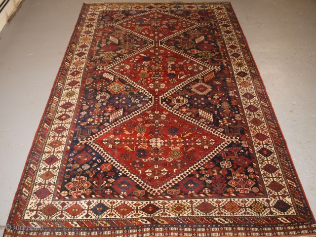 Antique south west Persian Qashqai tribal carpet of outstanding design. www.knightsantiques.co.uk Size: 10ft 2in x 6ft 4in (310 x 194cm). 

Circa 1880.

The carpet has three linked latch hook medallions each containing emblems  ...