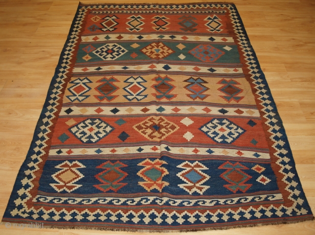 Size: 7ft 0in x 4ft 8in (213 x 143cm). www.knightsantiques.co.uk 

Antique Persian tribal Qashqai kilim, South West Persia.

Circa 1900.

A good Qashqai kilim with a bold banded design, natural dye colours throughout.

Excellent condition,  ...