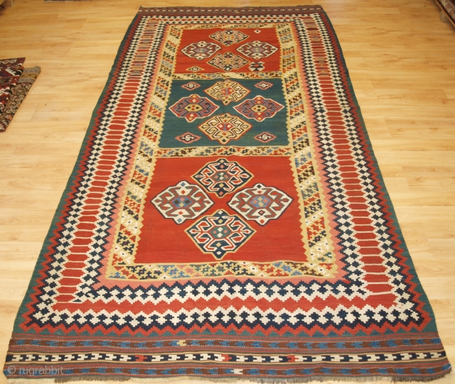 Size: 9ft 10in x 4ft 11in (300 x 150cm). www.knightsantiques.co.uk 

Antique Persian tribal Qashqai kilim, South West Persia.

Circa 1900.

A good Qashqai kilim with a bold three compartment design, natural dye colours throughout.  ...
