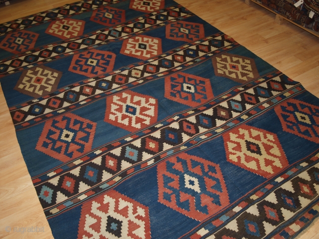 Antique South Caucasian Shirvan kilim of outstanding colour and design. www.knightsantiques.co.uk Size: 9ft 4in x 5ft 9in (285 x 175cm). 

Circa 1880.

A very good example of type, with an abrashed indigo blue  ...