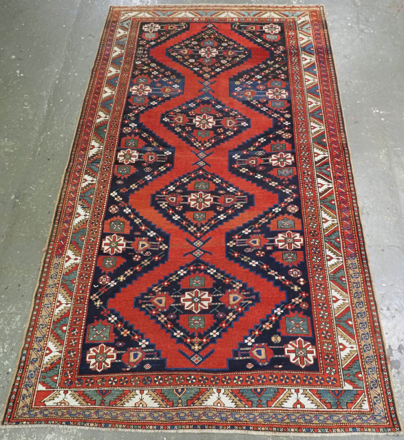 A good large size Kazak rug in excellent condition. Size: 323 x 183cm (10ft 11in x 6ft 0in). www.knightsantiques.co.uk
              