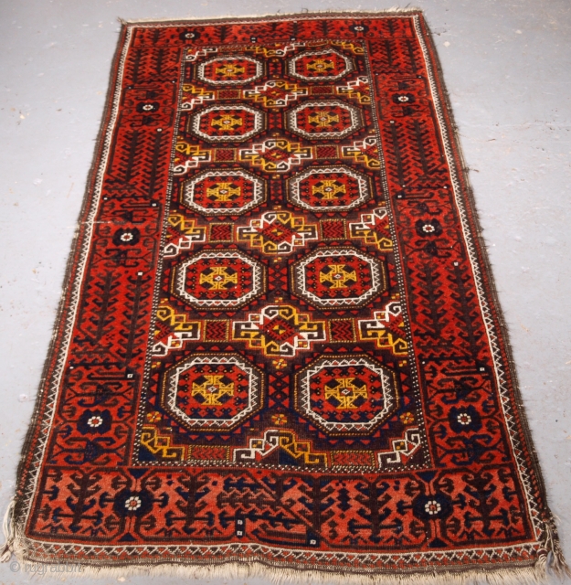 ***Spring sale*** £295.00 click the link www.knightsantiques.co.uk to view more items.

Size: 6ft 2in x 3ft 3in (187 x 100cm).

Antique Salar Khani Baluch rug with turreted gul design.

Circa 1900.

A very nice small Baluch  ...