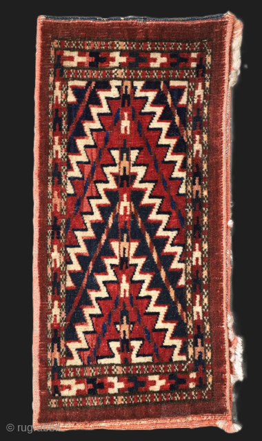 Antique Yomut Turkmen spindle bag, used for the storage of spinning bobbins.
Size: 1ft 6in x 8.5in (45 x 21cm).
Circa 1900.

A small spindle bag complete with plain weave back, these bags known by  ...