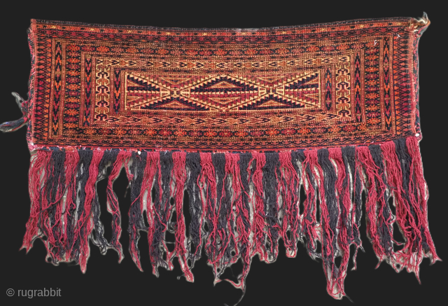 Antique Tekke Turkmen torba of fine weave and small size, with a scarce design to the central panel. Torba are shallow wall bags used mainly in tents or yurts for the storage  ...