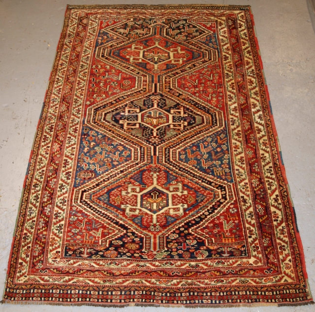 A good Antique Tribal Qashqai rug, triple linked medallion design with superb colour. www.knightsantiques.co.uk Size: 6ft 9in x 4ft 4in (206 x 133cm). 

Late 19th century.

A very pleasing rug with three linked  ...