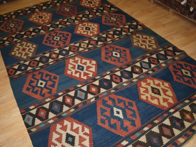 Antique South Caucasian Shirvan kilim of outstanding colour and design. www.knightsantiques.co.uk 
Size: 9ft 4in x 5ft 9in (285 x 175cm). 
Circa 1880.

A very good example of type, with an abrashed indigo blue  ...