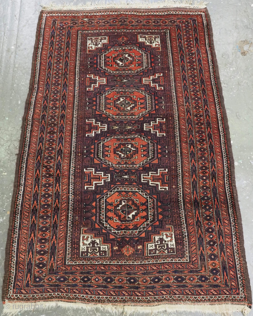 Size: 6ft 11in x 4ft 4in (210 x 131cm).

Antique Baluch rug by the Yaqoub Khani sub tribe with octogen medallion design.

Circa 1900.

The rug has four large turreted octogen guls on a rich  ...