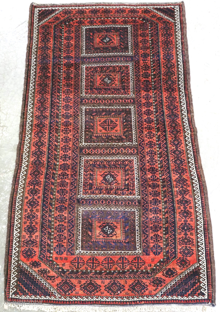 Size: 5ft 7in x 3ft 1in (170 x 94cm).

Antique Baluch rug, by the Mahdad Khani tribe of the Khorasan region of Eastern Persia.

Circa 1900.

A good Baluch rug with one of the less  ...