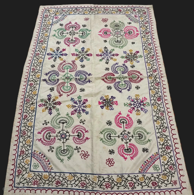 Antique Uzbek suzani of small size, silk embroidery on ivory coloured silk ground.
Size: 6ft 0in x 4ft 0in (182 x 122cm).
Circa 1900/20.
Suzani are silk embroideries that have been woven in Uzbekistan for ...