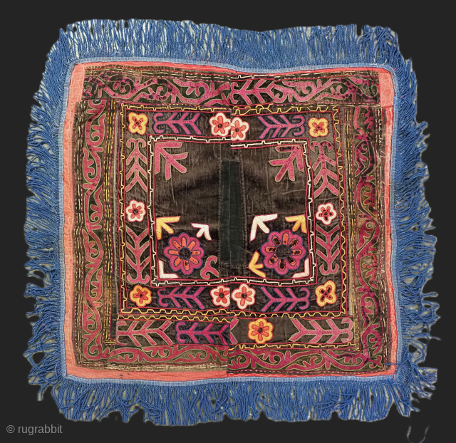 Antique Uzbek Lakai tribe ilgich, dowry wall hanging for the yurt.
Size: 2ft 2in x 2ft 2in (65 x 65cm) excluding tassels.
Circa 1900.

Ilgich are embroidered hangings that usually formed part of a brides  ...