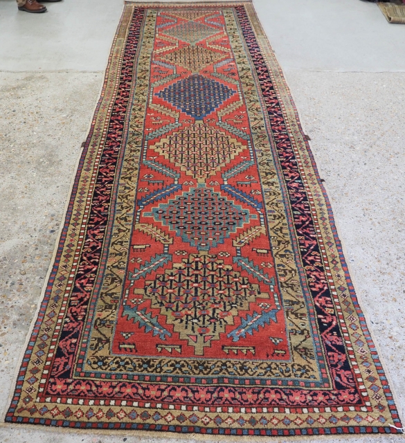 Antique Heriz runner of good size, with an unusual medallion design. www.knightsantiques.co.uk 
Size: 12ft 10in x 3ft 7in (392 x 109cm). 
Circa 1900. 

The runner has a repeat medallion design on a  ...