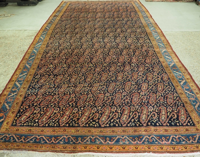 Antique kelleh carpet or long rug from the region of Serabend with all over boteh design. www.knightsantiques.co.uk 
Size: 14ft 11in x 7ft 5in (455 x 225cm). 
Circa 1900. 

The carpet has a  ...