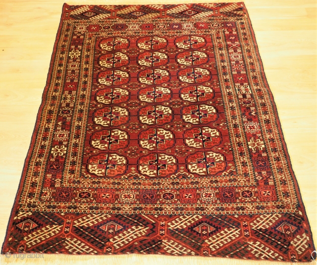 Antique Tekke Turkmen rug of small size with excellent colour. www.knightsantiques.co.uk 
Size: 4ft 8in x 3ft 7in (142 x 108cm).
Circa 1880.

The rug has three rows of seven Tekke guls, these are will  ...