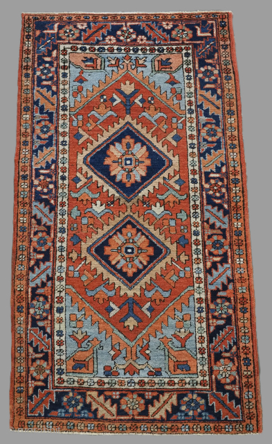 Antique north-west Persian Karaja / Heriz region rug of small size with superb colour.
Size: 5ft 7in x 2ft 11in (169 x 89cm).
Circa 1900.
This is an outstanding small rug with soft pastel colours, ...