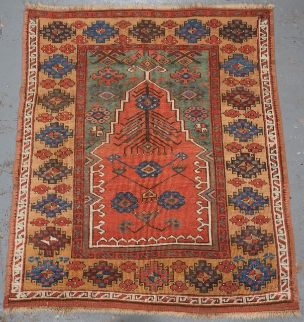 Antique Central Anatolian Konya region village prayer rug.
www.knightsantiques.co.uk
Circa 1850.
Size: 4ft 3in x 3ft 6in (130 x 106cm).
A superb example of a Konya prayer rug, the soft red central mihrab is floating on  ...
