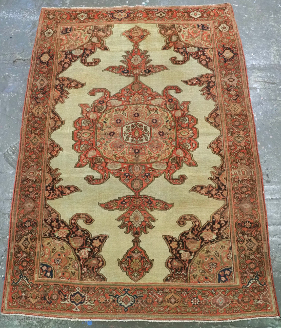 Antique North West Persian rug from the town of Malayer, the rug has a single medallion design on an ivory ground. www.knightsantiques.co.uk 
Circa 1900.
Size: 6ft 8in x 4ft 8in (202 x 141cm).
This  ...