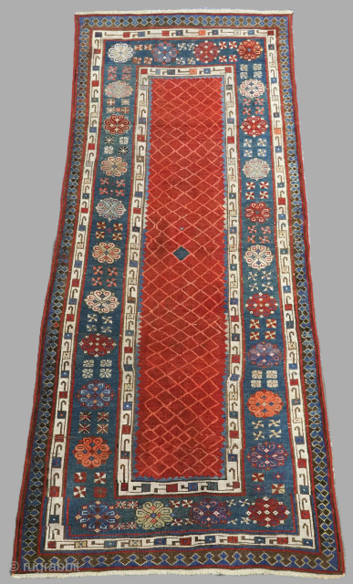 Antique Caucasian Talish long rug with a narrow red field.
Circa 1880.
Size: 7ft 5in x 3ft 2in (225 x 97cm).
This is a pleasing example of a Talish long rug, it has a classic ...