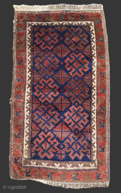 Size: 3ft 1in x 1ft 9in (95 x 53cm).

Antique Baluch pushti bag face with a repeat design on a dark indigo blue ground.

Circa 1900.

Pushti were used as pillows or back rests, they  ...