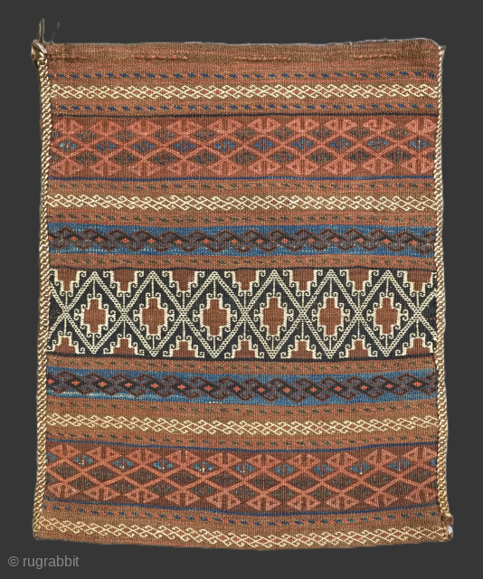 Size: 2ft 6in x 2ft 0in (75 x 60cm).

Antique Baluch storage bag with weft work design.

Circa 1900.

This fine storage bag (possibly once 1/2 of a pair of saddle bags), is by the  ...