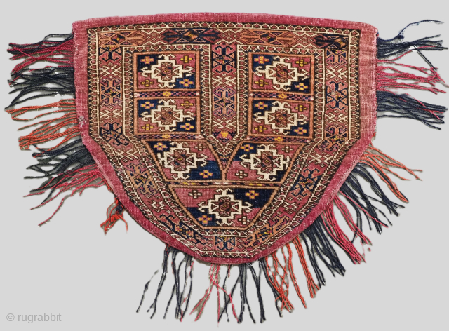 Antique Tekke Turkmen saddle cover / rug with aina design.
Size: 1ft 10in x 1ft 7in (57 x 48cm).
Circa 1900.

This excellent tribal saddle rug by the Tekke Turkmen of Turkmenistan features an interesting  ...