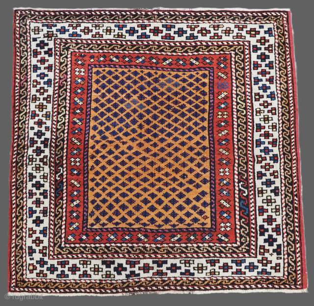 Antique Turkish Bergama rug of small square size, the rug has an interesting all over diamond lattice design.
Size: 3ft 5in x 3ft 3in (103 x 100cm).
Circa 1900.
The rug has a fine lattice ...