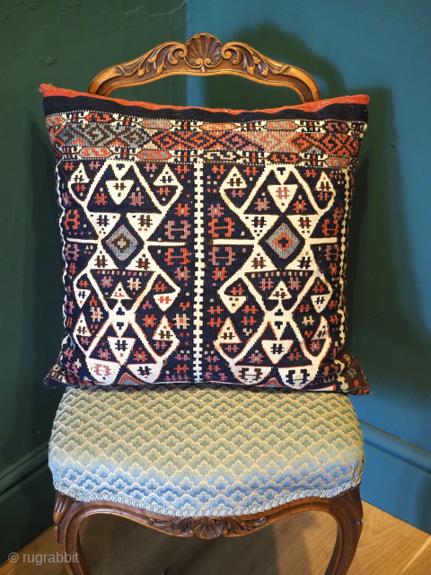 Antique saddle bag kilim cushion, the cushion is half of a saddle bag from the Malatya region of Turkey, circa 1900.
The back is the original back of the saddle bag with interesting ...