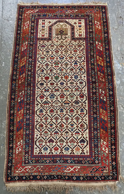 Antique Caucasian Dagestan prayer rug with floral lattice on an ivory ground.
Size: 5ft 5in x 2ft 11in (165 x 90cm).
Circa 1850/60.
An outstanding and early example of this well known group of prayer ...