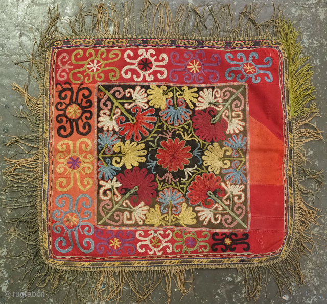 Antique Uzbek Lakai tribe ilgich, dowry wall hanging for the yurt.
Size: 1ft 8in x 1ft 7in (52 x 48cm) excluding tassels.
Circa 1900.
Ilgich are embroidered hangings that usually formed part of a brides ...