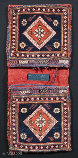 Antique Afshar miniature khorjin (saddle bag) of very small size.
www.knightsantiques.co.uk
Circa 1900.
Size: 2ft 3in x 11in. (69 x 29cm)
Complete khorjin of this quality are quite scarce, this example is in outstanding condition with  ...